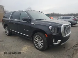 2023 GMC Yukon XL Denali with VIN 1GKS1JKL0PR210658, listed as a Copart auction lot 42574575 with 61,306 mi miles and Clean Title. Bid and sale history available at carsss.com. Image 4.