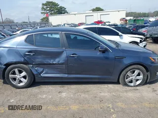 2015 Kia Optima LX with VIN 5XXGM4A74FG417988, listed as a IAAI auction lot 41805916 with 135,000 mi miles. Bid and sale history available at carsss.com. Image 13.