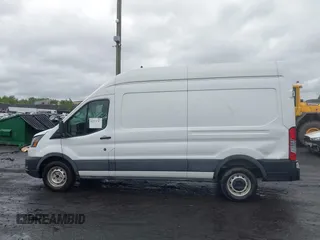 2021 Ford Transit Cargo with VIN 1FTBW1X84MKA98047, listed as a IAAI auction lot 42313747 with 65,600 mi miles and . Bid and sale history available at DreamBid. Image 14.