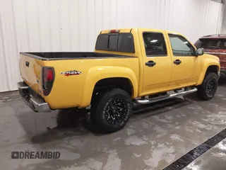 2007 GMC Canyon SLE2 with VIN 1GTDT13E478122412, listed as a IAAI auction lot 41365728 with 100,849 mi miles. Bid and sale history available at carsss.com. Image 4.
