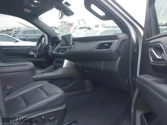 2022 Chevrolet Tahoe Z71 with VIN 1GNSKPKD4NR117277, listed as a IAAI auction lot 41547290 with 76,859 mi miles. Bid and sale history available at carsss.com. Image 5.
