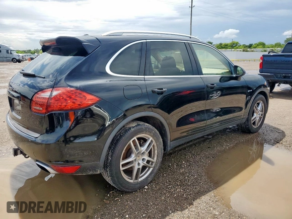 2013 Porsche Cayenne S Hybrid с VIN WP1AE2A20DLA14095, выставлен на аукционе Copart как лот 64215625 с пробегом 148 286 миль миль и Списание • Salvage title. История ставок и продаж доступна на DreamBid. Изображение 3.