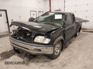 2001 Toyota Tundra SR5 with VIN 5TBRT34131S169696, listed as a IAAI auction lot 41481456 with 215,679 mi miles and . Bid and sale history available at DreamBid. Image 2.
