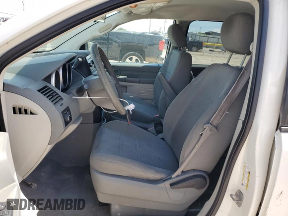 2009 Dodge Grand Caravan SE with VIN 1D8HN44E29B509835, listed as a Copart auction lot 56311925 with 105,108 mi miles and Salvage title. Bid and sale history available at DreamBid. Image 7.