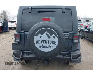 2017 Jeep Wrangler Unlimited Sahara with VIN 1C4BJWEG3HL569143, listed as a IAAI auction lot 41986188 with 27,495 mi miles. Bid and sale history available at carsss.com. Image 16.
