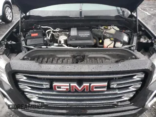 2021 GMC Sierra 1500 AT4 with VIN 3GTU9EET9MG326162, listed as a Copart auction lot 84890804 with 68,723 mi miles and Salvage Title. Bid and sale history available at carsss.com. Image 11.