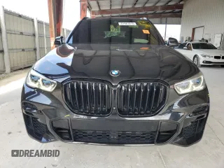 2022 BMW X5 xDrive40i with VIN 5UXCR6C0XN9M08766, listed as a Copart auction lot 51987215 with 30,997 mi miles and Salvage Title. Bid and sale history available at DreamBid. Image 5.