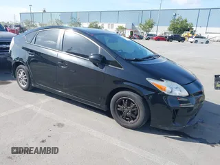 2015 Toyota Prius Four with VIN JTDKN3DU0F1986030, listed as a IAAI auction lot 42034054 with 194,915 mi miles. Bid and sale history available at carsss.com. Image 1.