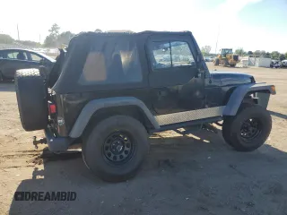 2002 Jeep Wrangler X with VIN 1J4FA39S12P732459, listed as a Copart auction lot 68877244 with 167,368 mi miles and Salvage Title. Bid and sale history available at carsss.com. Image 3.
