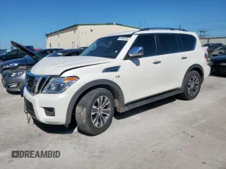 2019 Nissan Armada SL z VIN JN8AY2ND4K9085996, wystawiony jako Copart lot #51916125 z przebiegiem 125 050 mil mil oraz Szkoda całkowita • Salvage title. Historia ofert i sprzedaży dostępna na DreamBid. Obrazek 1.