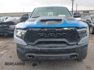 2021 Ram 1500 TRX with VIN 1C6SRFU91MN790158, listed as a IAAI auction lot 42115253 with 30,969 mi miles and . Bid and sale history available at DreamBid. Image 12.