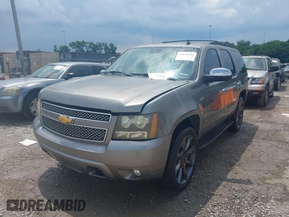2007 Chevrolet Tahoe LT z VIN 1GNFK13077J372162, wystawiony jako IAAI lot #42656552 z przebiegiem 218 352 mil mil oraz . Historia ofert i sprzedaży dostępna na DreamBid. Obrazek 6.