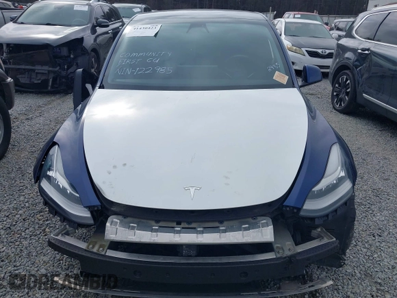 2021 Tesla Model Y Standard Range with VIN 5YJYGDED8MF122985, listed as a IAAI auction lot 41430423 with 120,302 mi miles and . Bid and sale history available at carsss.com. Image 6.