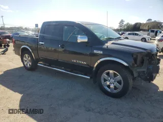 2010 Nissan Titan SE with VIN 1N6BA0ED4AN312650, listed as a Copart auction lot 47284915 with 266,394 mi miles and Salvage Title. Bid and sale history available at carsss.com. Image 4.
