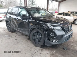 2019 Honda Passport Sport with VIN 5FNYF7H24KB005481, listed as a IAAI auction lot 41602679 with 48,877 mi miles and . Bid and sale history available at carsss.com. Image 1.