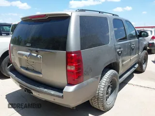 2007 Chevrolet Tahoe LT with VIN 1GNFC13007J405418, listed as a IAAI auction lot 42631830 with 225,156 mi miles and . Bid and sale history available at DreamBid. Image 4.
