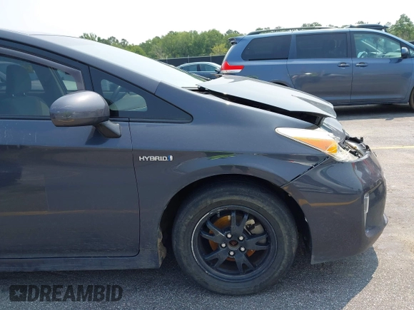 2015 Toyota Prius Four with VIN JTDKN3DU3F0458455, listed as a IAAI auction lot 42389286 with 215,703 mi miles and . Bid and sale history available at DreamBid. Image 17.