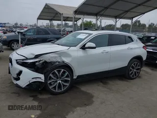 2022 BMW X2 sDrive28i z VIN WBXYH9C06N5U37719, wystawiony jako IAAI lot #42355050 z przebiegiem 33 127 mil mil oraz . Historia ofert i sprzedaży dostępna na DreamBid. Obrazek 13.