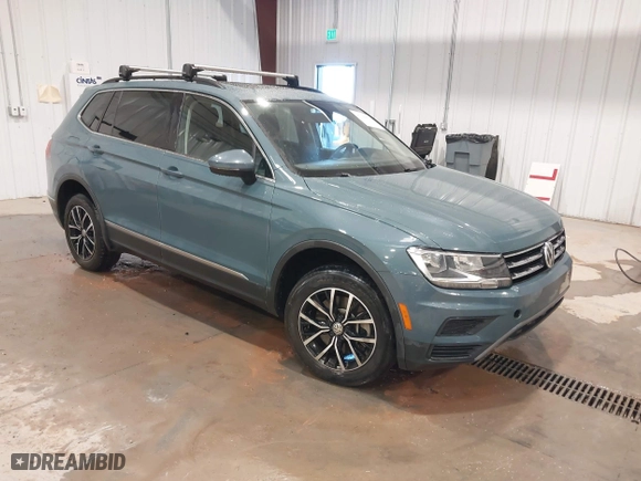 2021 Volkswagen Tiguan SE with VIN 3VV2B7AX6MM077337, listed as a IAAI auction lot 41345637 with 62,989 mi miles. Bid and sale history available at carsss.com. Image 1.