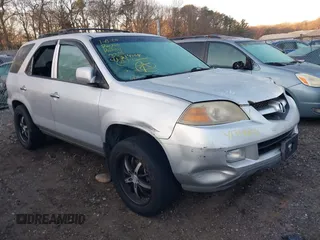 2004 Acura MDX Touring with VIN 2HNYD18734H514970, listed as a IAAI auction lot 41314004 with 999,999 mi miles. Bid and sale history available at carsss.com. Image 1.