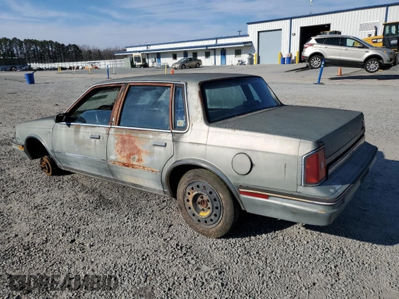 1986 Oldsmobile Cutlass Ciera with VIN 1G3AM19R8GG312651, listed as a Copart auction lot 42964415 with 67,874 mi miles and Clean Title. Bid and sale history available at DreamBid. Image 2.