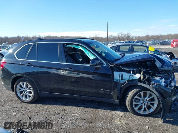 2016 BMW X5 xDrive40e z VIN 5UXKT0C54G0S78884, wystawiony jako IAAI lot #41208477 z przebiegiem 90 181 mil mil oraz . Historia ofert i sprzedaży dostępna na DreamBid. Obrazek 13.