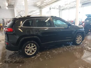 2015 Jeep Cherokee Latitude with VIN 1C4PJLCB9FW536767, listed as a IAAI auction lot 41380122 with 192,535 mi miles. Bid and sale history available at carsss.com. Image 13.