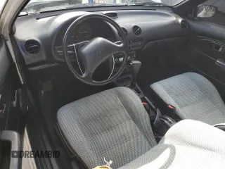 1992 Toyota Tercel z VIN JT2EL43B0N0152801, wystawiony jako Copart lot #43838825 z przebiegiem 81 697 mil mil oraz Tytuł czysty. Historia ofert i sprzedaży dostępna na DreamBid. Obrazek 8.