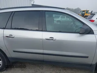 2016 Chevrolet Traverse LS z VIN 1GNKRFKD8GJ343572, wystawiony jako IAAI lot #42426571 z przebiegiem 168 568 mil mil oraz . Historia ofert i sprzedaży dostępna na DreamBid. Obrazek 13.