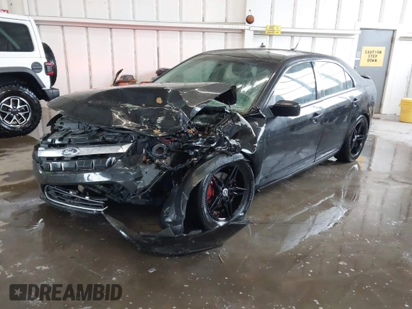 2012 Ford Fusion SE z VIN 3FAHP0HA5CR403929, wystawiony jako IAAI lot #42353429 z przebiegiem 208 668 mil mil oraz . Historia ofert i sprzedaży dostępna na DreamBid. Obrazek 2.