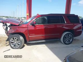 2018 Chevrolet Tahoe LT with VIN 1GNSCBKC5JR385935, listed as a IAAI auction lot 42116288 with 50,890 mi miles and . Bid and sale history available at DreamBid. Image 14.