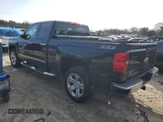 2014 Chevrolet Silverado 1500 LTZ with VIN 1GCVKSEC3EZ269921, listed as a Copart auction lot 84896084 with 136,671 mi miles and Salvage Title. Bid and sale history available at DreamBid. Image 2.