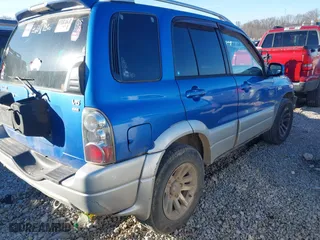 2005 Suzuki Grand Vitara LX with VIN JS3TD62V454200796, listed as a IAAI auction lot 41414899 with 228,069 mi miles. Bid and sale history available at carsss.com. Image 4.