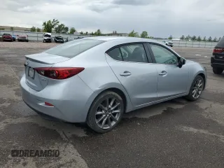 2018 Mazda 3 Touring z VIN 3MZBN1V38JM206424, wystawiony jako Copart lot #57914015 z przebiegiem 93 095 mil mil oraz Szkoda całkowita • Salvage title. Historia ofert i sprzedaży dostępna na DreamBid. Obrazek 3.
