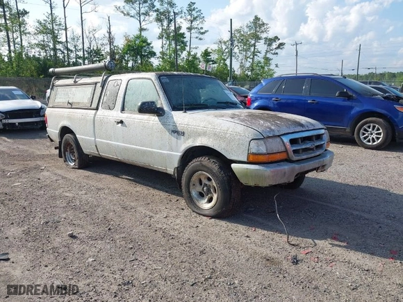 1999 Ford Ranger XL with VIN 1FTYR14V5XPA95547, listed as a IAAI auction lot 41928536 with 119,637 mi miles. Bid and sale history available at carsss.com. Image 1.