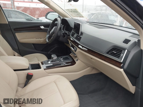 2019 Audi Q5 Premium Plus z VIN WA1BNAFY5K2049080, wystawiony jako IAAI lot #42057631 z przebiegiem 94 767 mil mil oraz . Historia ofert i sprzedaży dostępna na DreamBid. Obrazek 5.