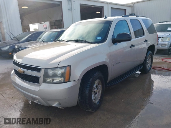 2007 Chevrolet Tahoe LS z VIN 1GNEC130X7R164139, wystawiony jako IAAI lot #42450827 z przebiegiem 232 144 mil mil oraz . Historia ofert i sprzedaży dostępna na DreamBid. Obrazek 2.