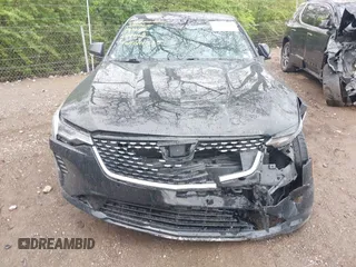 2023 Cadillac CT4 Premium Luxury z VIN 1G6DF5RK5P0109147, wystawiony jako IAAI lot #42124505 z przebiegiem 13 797 mil mil oraz . Historia ofert i sprzedaży dostępna na DreamBid. Obrazek 12.