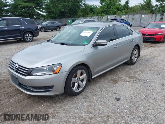 2013 Volkswagen Passat SE with VIN 1VWBP7A30DC098440, listed as a IAAI auction lot 42722686 with 305,716 mi miles and . Bid and sale history available at DreamBid. Image 2.