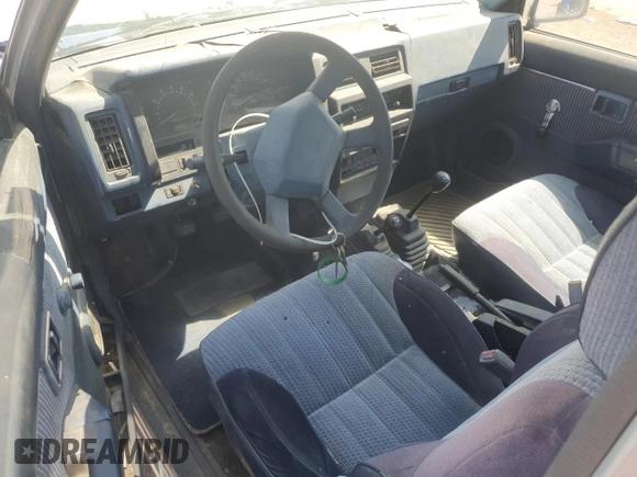 1992 Nissan Frontier SE z VIN 1N6HD16Y8NC358458, wystawiony jako Copart lot #62064905 z przebiegiem 226 678 mil mil oraz Czysty tytuł • Clean title. Historia ofert i sprzedaży dostępna na DreamBid. Obrazek 8.