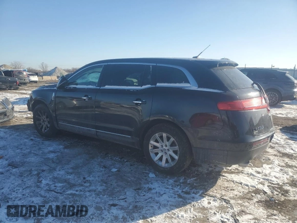 2015 Lincoln MKT with VIN 2LMHJ5NKXFBL00126, listed as a Copart auction lot 42053775 with 248,218 mi miles and Salvage Title. Bid and sale history available at DreamBid. Image 2.