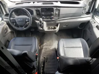 2023 Ford Transit Cargo с VIN 1FTBR2X88PKA66512, выставлен на аукционе Copart как лот 58451445 с пробегом 74 819 миль миль и Списание • Salvage title. История ставок и продаж доступна на DreamBid. Изображение 8.