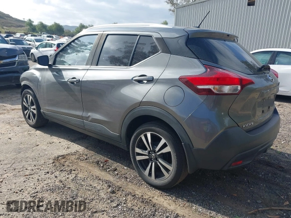 2019 Nissan Kicks SR with VIN 3N1CP5CU9KL483310, listed as a IAAI auction lot 41885087 with 128,055 mi miles. Bid and sale history available at carsss.com. Image 3.