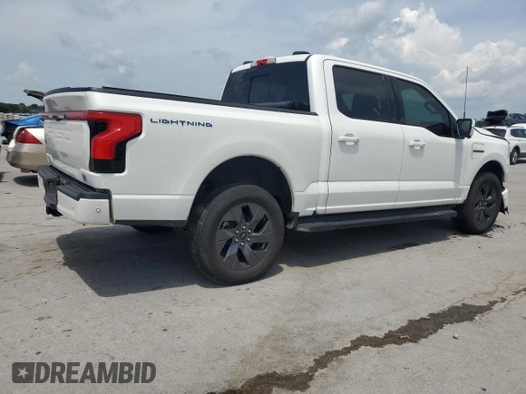 2022 Ford F-150 Lightning Pro with VIN 1FTVW1EL3NWG16146, listed as a Copart auction lot 65322785 with 68,928 mi miles and Salvage title. Bid and sale history available at DreamBid. Image 3.