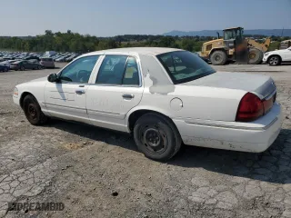 2004 Mercury Grand Marquis GS with VIN 2MEFM74W34X623107, listed as a Copart auction lot 72426544 with 198,850 mi miles and Salvage Title. Bid and sale history available at carsss.com. Image 2.