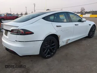 2022 Tesla Model S with VIN 5YJSA1E57NF483768, listed as a IAAI auction lot 41069339 with 35,342 mi miles and . Bid and sale history available at DreamBid. Image 4.