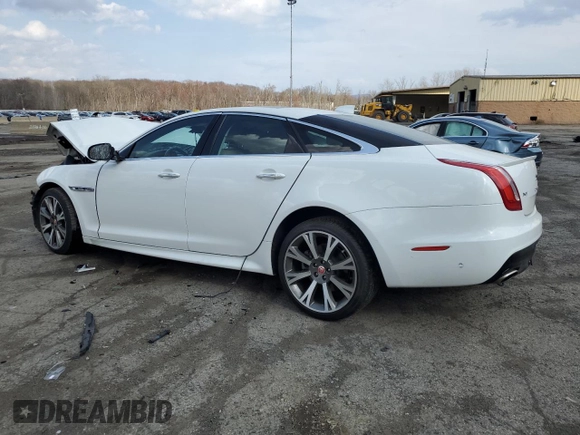 2019 Jaguar XJ with VIN SAJWJ1CD5K8W19663, listed as a Copart auction lot 51071665 with 28,468 mi miles and Salvage Title. Bid and sale history available at carsss.com. Image 2.