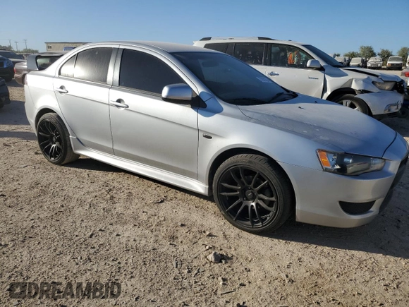 2014 Mitsubishi Lancer ES with VIN JA32U2FU8EU013693, listed as a Copart auction lot 77821024 with 130,306 mi miles and Salvage Title. Bid and sale history available at DreamBid. Image 4.