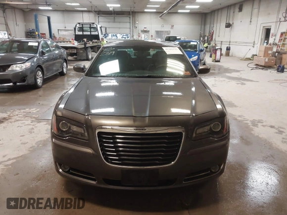 2014 Chrysler 300 with VIN 2C3CCAGG0EH179435, listed as a IAAI auction lot 41202319 with 149,410 mi miles. Bid and sale history available at carsss.com. Image 12.