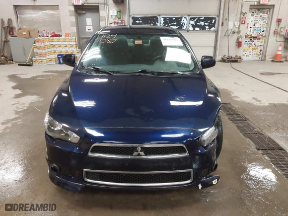 2013 Mitsubishi Lancer SE with VIN JA32V2FW9DU005616, listed as a IAAI auction lot 41247087 with 129,055 mi miles. Bid and sale history available at carsss.com. Image 12.